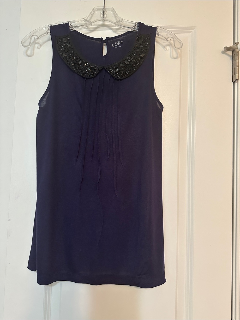 Loft sz small navy sleeveless top w/ Peter Pan collar with black embellishments.